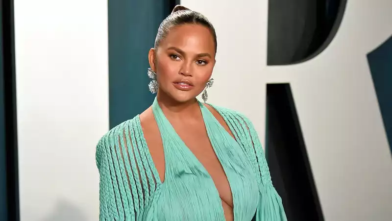 Chrissy Teigen gets the best cake to say goodbye to breast implants