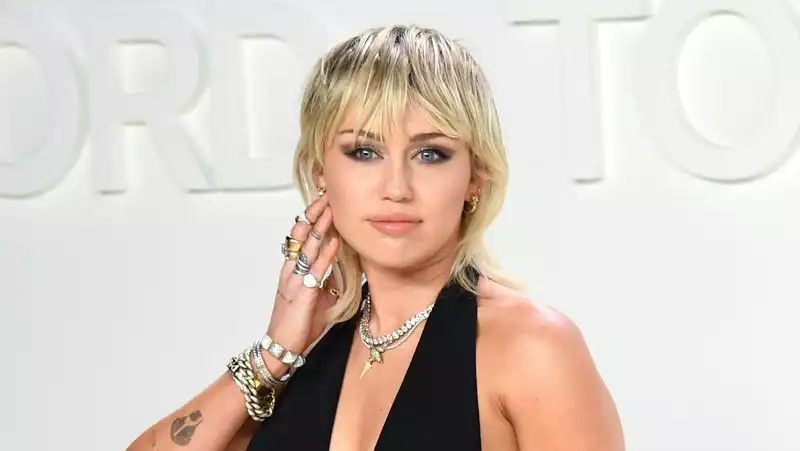 Miley Cyrus' mother, Tish, cuts her hair into a very short pixie mullet.