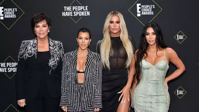 Kourtney and Khloe Kardashian both deny pregnancy theories.