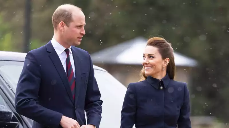 Kate Middleton wears military-style skirt suit for a rainy day out