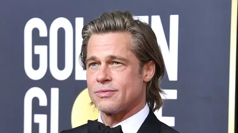 Brad Pitt calls his personal life a "disaster" in interview with Leonardo DiCaprio.