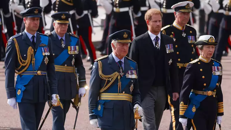 Prince William tells mourners that walking behind the Queen's coffin reminds him of his mother Princess Diana's funeral.