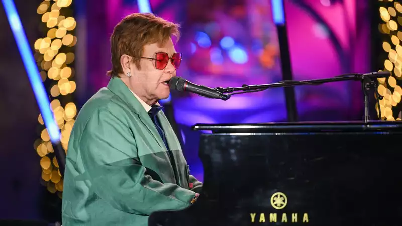 Sir Elton John was a surprise guest at Saks' holiday window unveiling ceremony.