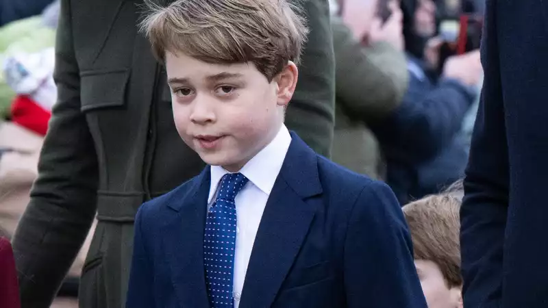 Prince George's cousin Mia Tindall flirts to get Prince George's attention during a Christmas walk in Sandringham.