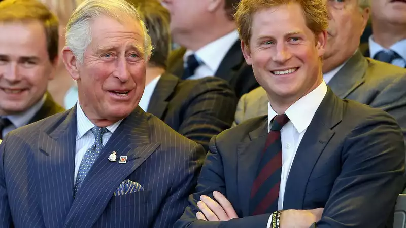 Prince Charles "didn't hug" Prince Harry when he told him of Princess Diana's death, but was "fatherly" and "kind" to him.