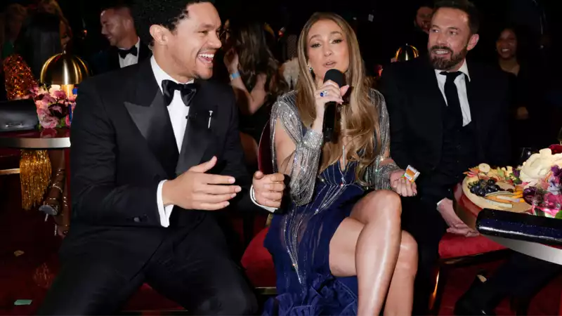 Jennifer Lopez jokes about Ben Affleck's "happy face," which became a Grammy meme.