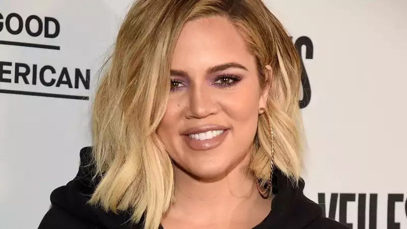 Khloe Kardashian explains why she has not yet revealed her son's name.