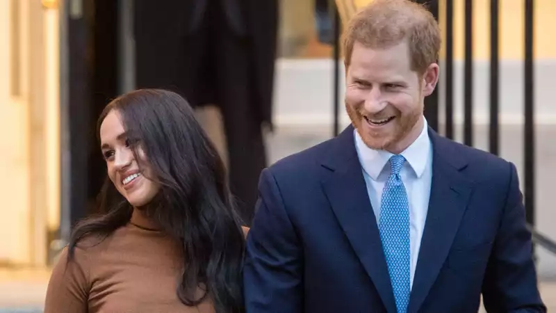 Prince Harry and Meghan Markle plan to give up their Sussex title and take Princess Diana's last name, Spencer, a royal writer claims.