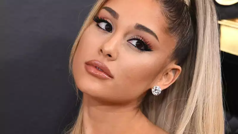 Ariana Grande and Dalton Gomez clean up their 2021 wedding day photos from social media.