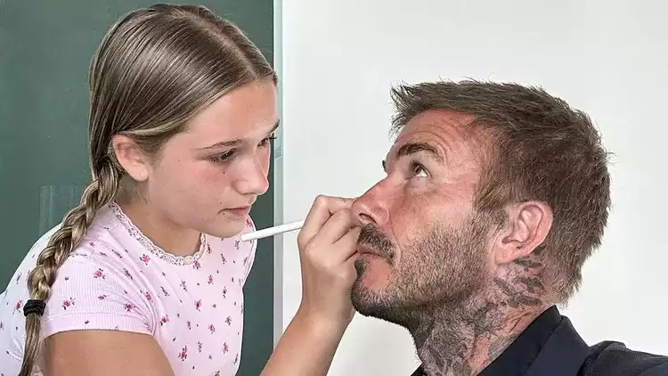 David Beckham is happy to let his daughter Harper do his makeup: "My Little Makeup Artist."