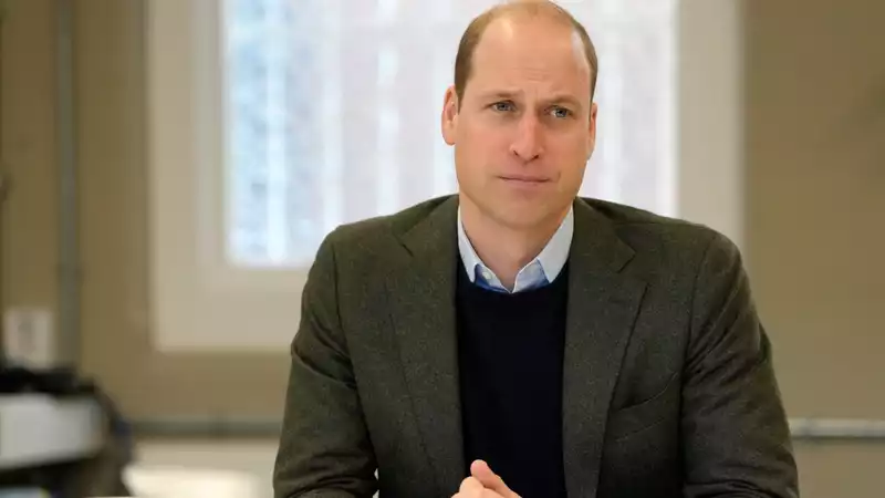 Prince William surprises royal fans by serving hamburgers at a food truck.