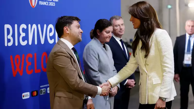 Princess Kate, it appears to be a "bone-crushing handshake."