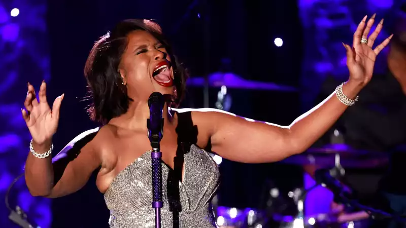 Jennifer Hudson performs at the couple's wedding.