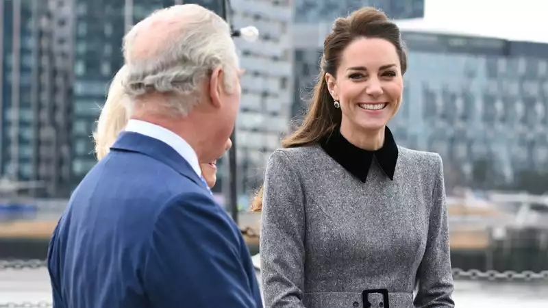 Prince Charles, apparently closer to Princess Kate than to his own son, Prince William.