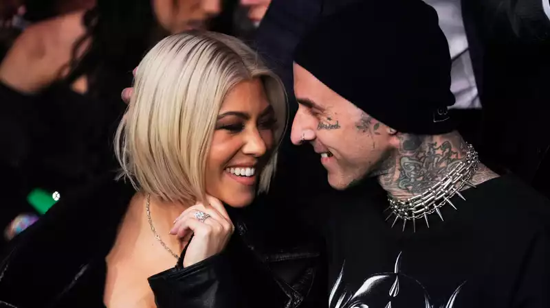 Kourtney Kardashian cheers on husband Travis Barker at the NYE Half Marathon