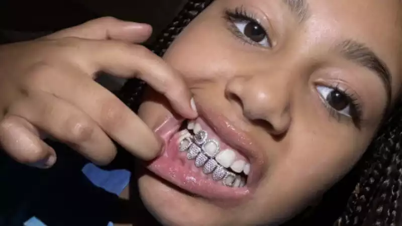 North West shows off diamond grill on TikTok: "Random"