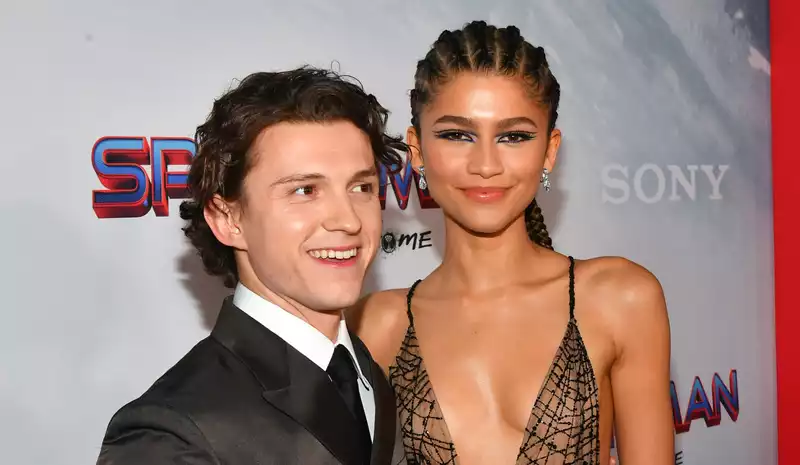 Tom Holland reveals that he and Zendaya sometimes look back on 2017's "Spider-Man" and miss it.